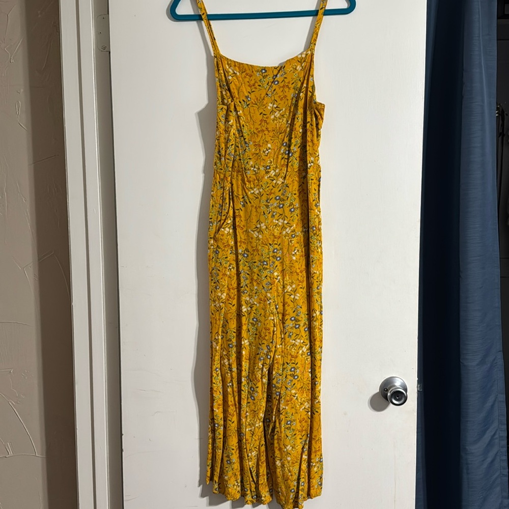 Yellow (mustard) floral, spaghetti strap jumper with stretchy backside.
